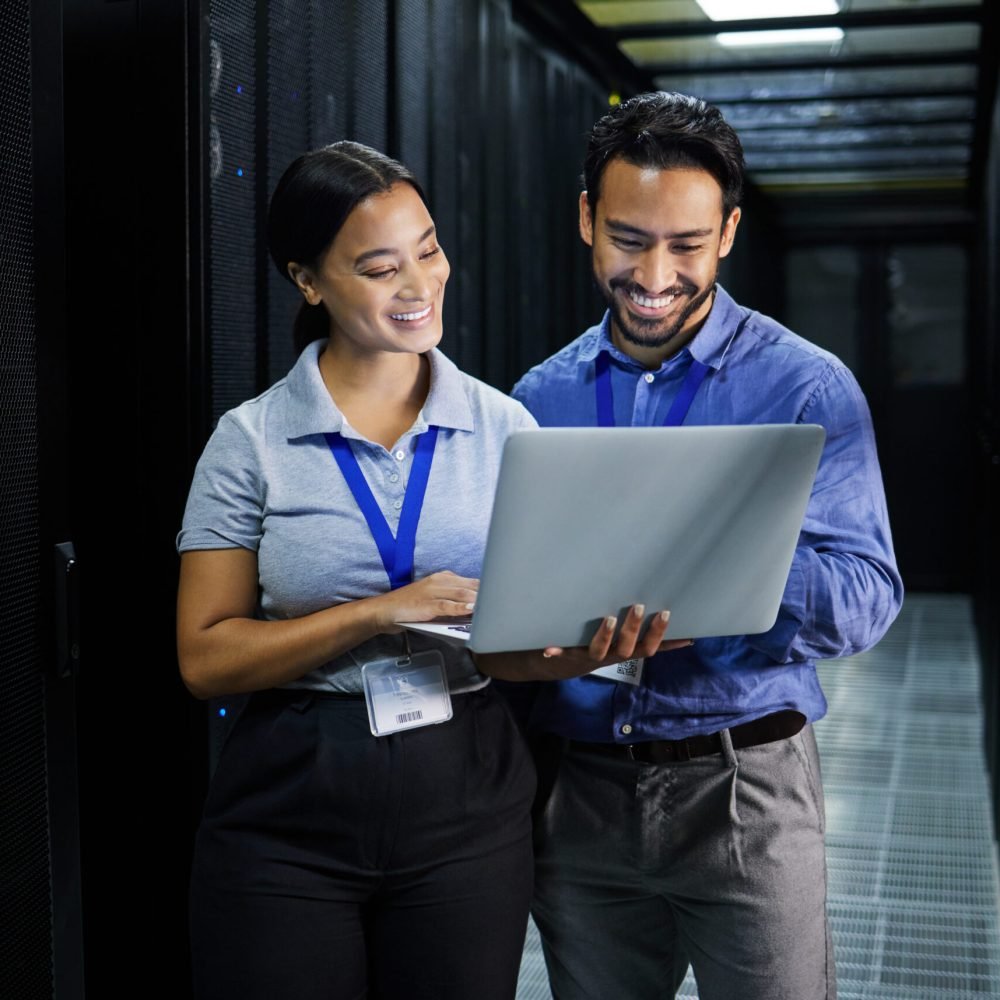 Server room, laptop and people team for software management, system upgrade and cyber security. Tea.