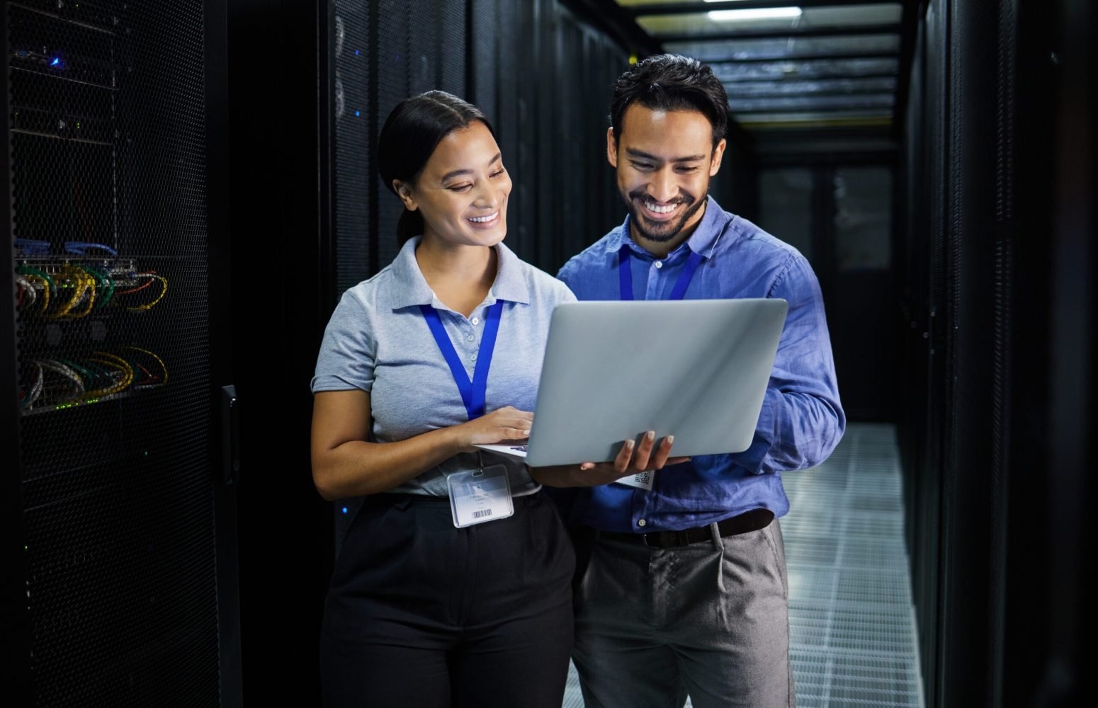 Server room, laptop and people team for software management, system upgrade and cyber security. Tea.